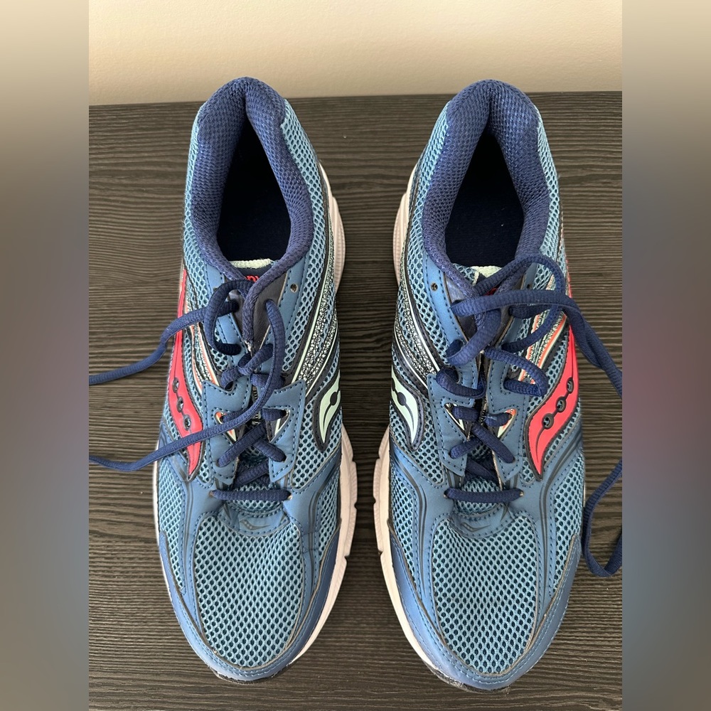 Size 9.5 blue Saucony Cohesion 9 running shoes.